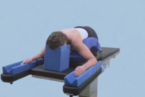 Woman prone on a surgery table